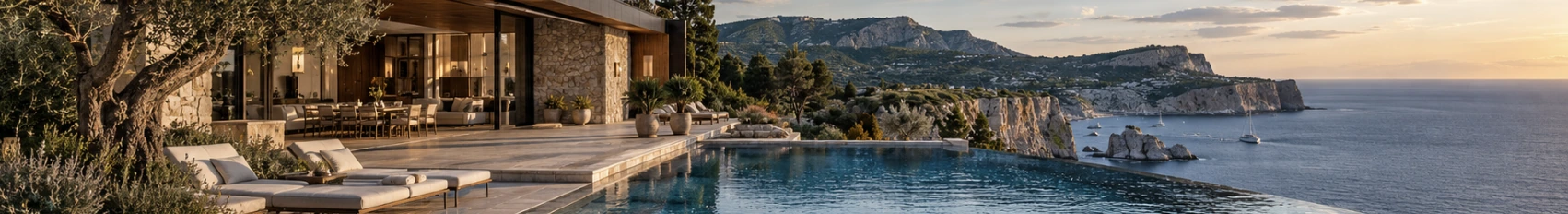 A clifftop residence terrace and pool above the sea